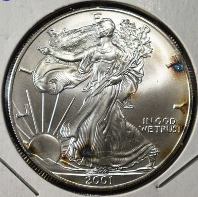 2001 AMERICAN SILVER EAGLE. BID WITH SILVER CITY AUCTIONS ESTIMATE $100 - $150.