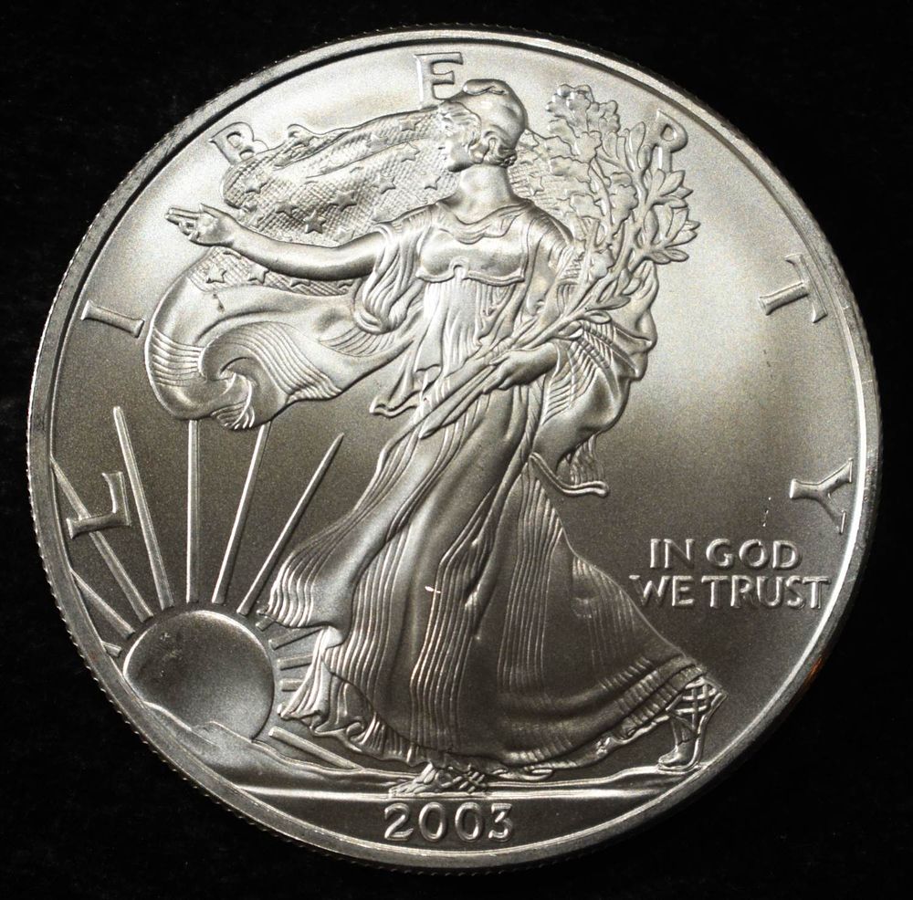 2003 AMERICAN SILVER EAGLE. TOP RATED AUCTION HOUSE ESTIMATE $130 - $180.