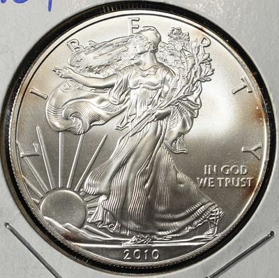 2010 AMERICAN SILVER EAGLE. CHECK OUT OUR UPCOMING AUCTIONS ESTIMATE $100 - $150.