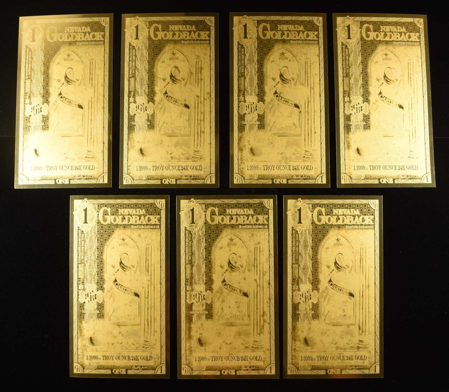 (7) $1 GOLDBACKS 1/100OTH TROY OZ 24K GOLD
