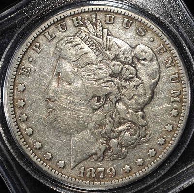 1879 MORGAN DOLLAR. TOP RATED AUCTION HOUSE ESTIMATE $80 - $120.