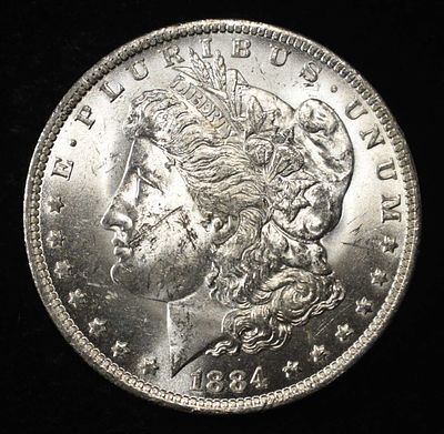 1884-O MORGAN DOLLAR BU. TOP RATED AUCTION HOUSE ESTIMATE $130 - $150.