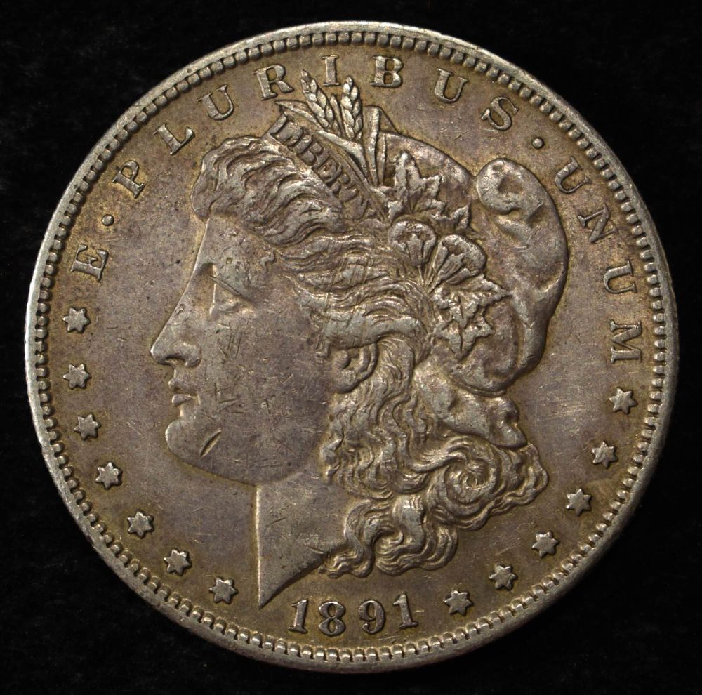 1891-S MORGAN DOLLAR. BID WITH SILVER CITY AUCTIONS ESTIMATE $100 - $150.