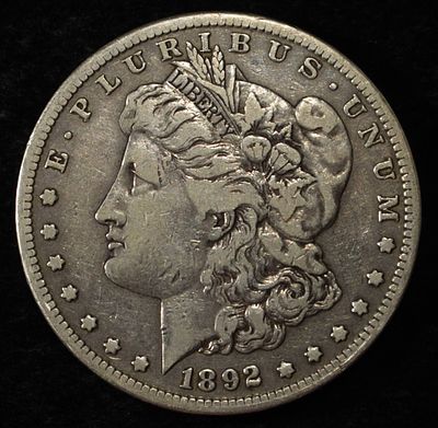 1892-S MORGAN DOLLAR. TOP RATED AUCTION HOUSE ESTIMATE $200 - $250.