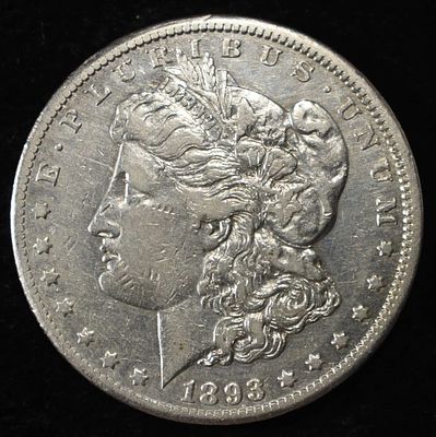 1893-CC MORGAN DOLLAR XF/AU. CHECK OUT OUR UPCOMING AUCTIONS ESTIMATE $3000 - $3500.