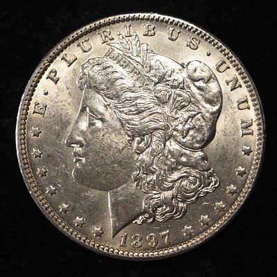 1897-O MORGAN DOLLAR BU. WEEKLY COIN & CURRENCY AUCTIONS ESTIMATE $1100 - $1300.