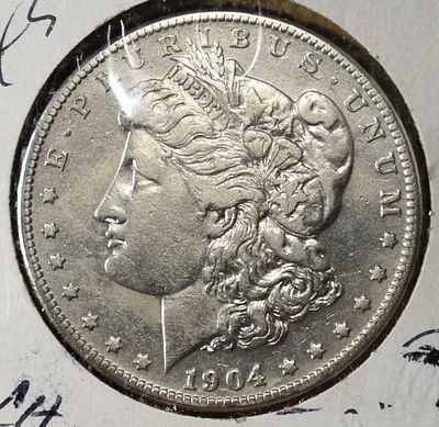 1904-S MORGAN DOLLAR CH AU. CHECK OUT OUR UPCOMING AUCTIONS ESTIMATE $1800 - $2300.