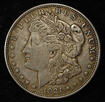 1921 MORGAN DOLLAR. TOP RATED AUCTION HOUSE ESTIMATE $90 - $130.