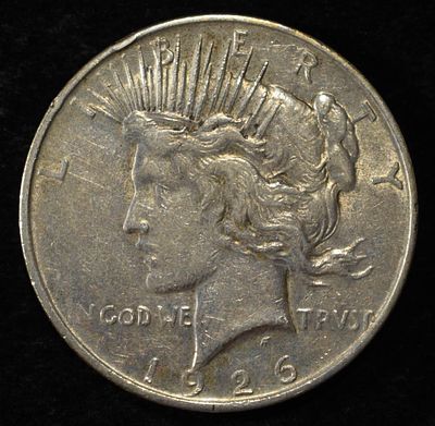 1926-D PEACE DOLLAR. CHECK OUT OUR UPCOMING AUCTIONS ESTIMATE $80 - $120.