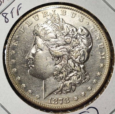 1878 8TF MORGAN DOLLAR AU. LEADERS IN ON-LINE AUCTIONS ESTIMATE $150 - $200.