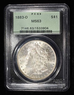 1883-O MORGAN DOLLAR PCGS MS-63 OLD GREEN HOLDER. WEEKLY COIN & CURRENCY AUCTIONS ESTIMATE $130 