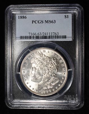 1886 MORGAN DOLLAR PCGS MS-63. LEADERS IN ON-LINE AUCTIONS ESTIMATE $130 - $150.