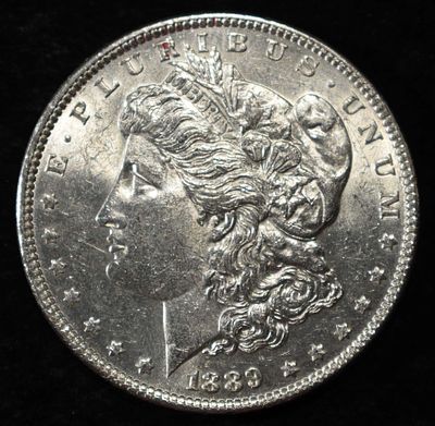 1889 MORGAN DOLLAR AU. WEEKLY COIN & CURRENCY AUCTIONS ESTIMATE $90 - $130.