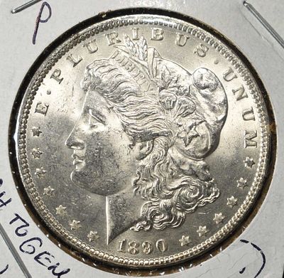 1890 MORGAN DOLLAR CH TO GEM BU. BID WITH SILVER CITY AUCTIONS ESTIMATE $150 - $200.