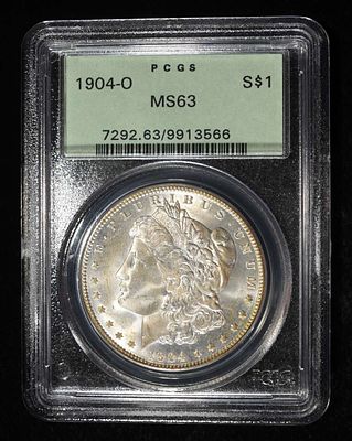 1904-O MORGAN DOLLAR PCGS MS-63 OLD GREEN HOLDER. WEEKLY COIN & CURRENCY AUCTIONS ESTIMATE $130 