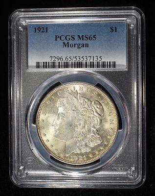 1921 MORGAN DOLLAR PCGS MS-65. LEADERS IN ON-LINE AUCTIONS ESTIMATE $200 - $250.