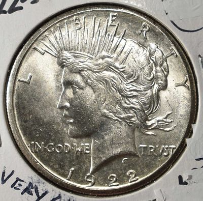 1922-S PEACE DOLLAR VERY CH BU. BID WITH SILVER CITY AUCTIONS ESTIMATE $160 - $210.