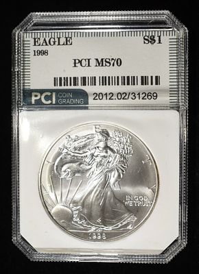 1998 AMERICAN SILVER EAGLE PCI PERFECT GEM BU. WEEKLY COIN & CURRENCY AUCTIONS ESTIMATE $110 - $160.