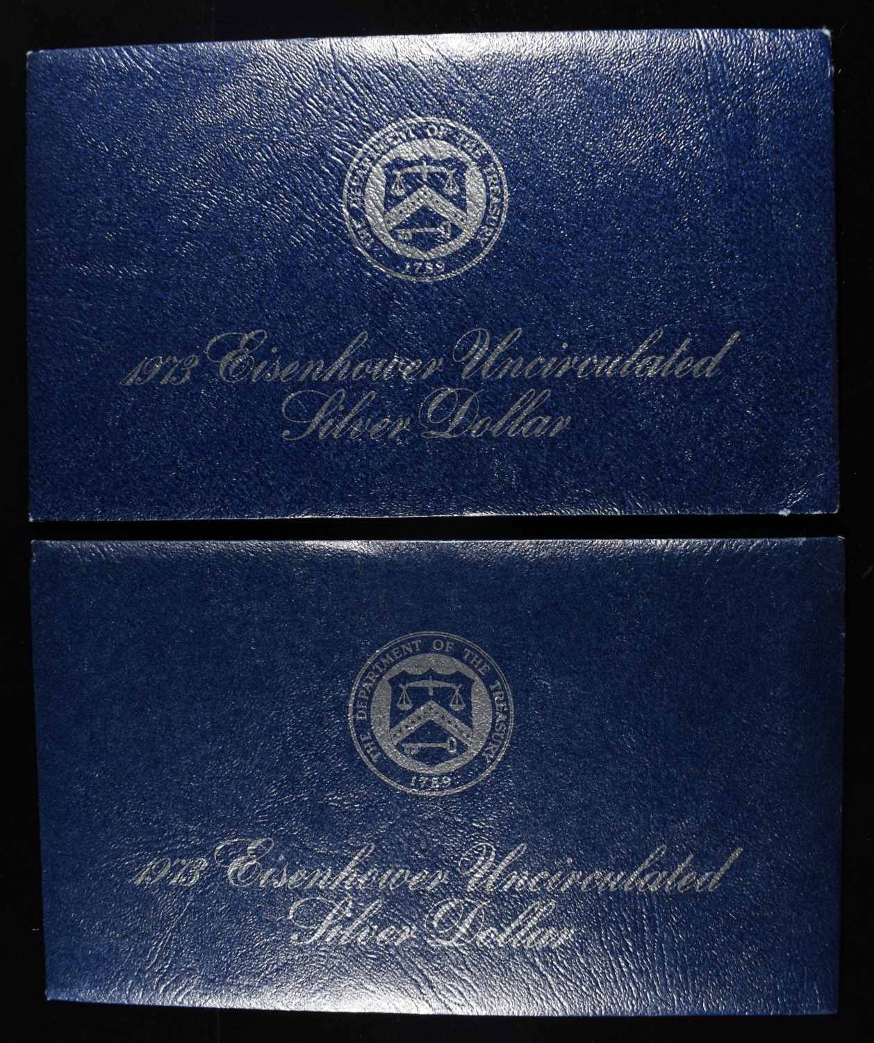 (2) 1973 EISENHOWER DOLLAR BLUE PACKAGING