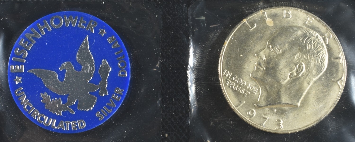 (2) 1973 EISENHOWER DOLLAR BLUE PACKAGING