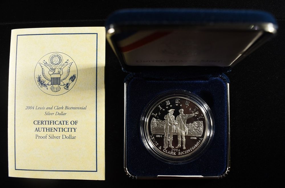 2004-P $1 COMMEM LEWIS & CLARK. CHECK OUT OUR UPCOMING AUCTIONS ESTIMATE $90 - $130.