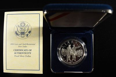 2004-P $1 COMMEM LEWIS & CLARK. CHECK OUT OUR UPCOMING AUCTIONS ESTIMATE $90 - $130.
