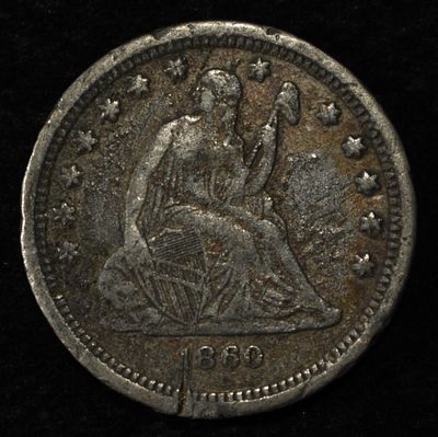 1860-O LIBERTY SEATED QUARTER. LEADERS IN ON-LINE AUCTIONS ESTIMATE $75 - $100.