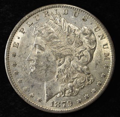1879-O MORGAN DOLLAR AU. TOP RATED AUCTION HOUSE ESTIMATE $100 - $130.