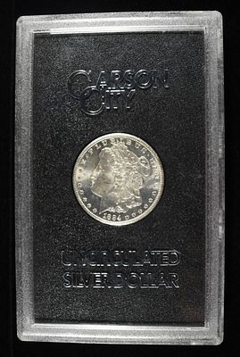 1884-CC MORGAN DOLLAR GSA. CHECK OUT OUR UPCOMING AUCTIONS ESTIMATE $450 - $550.