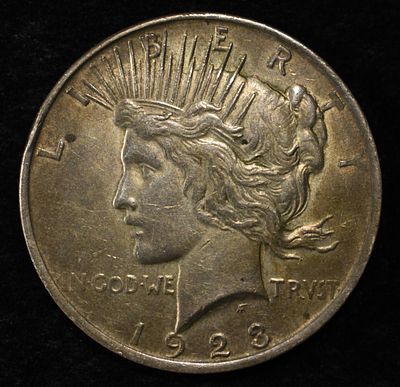 1923 PEACE DOLLAR. TOP RATED AUCTION HOUSE ESTIMATE $90 - $130.