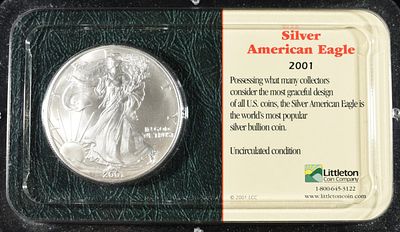 2001 AMERICAN SILVER EAGLE. LEADERS IN ON-LINE AUCTIONS ESTIMATE $100 - $150.