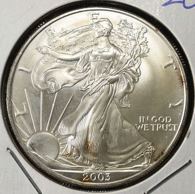 2003 AMERICAN SILVER EAGLE. WEEKLY COIN & CURRENCY AUCTIONS ESTIMATE $100 - $150.
