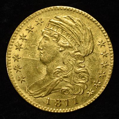 1811 $5 CAPPED BUST GOLD CH BU. CHECK OUT OUR UPCOMING AUCTIONS ESTIMATE $24000 - $25000.