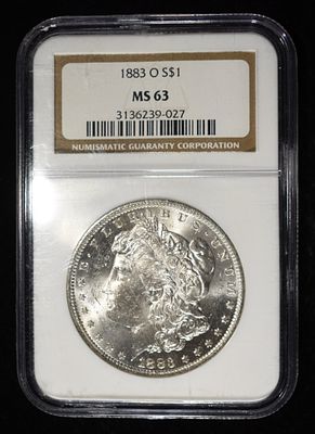 1883-O MORGAN DOLLAR NGC MS63. LEADERS IN ON-LINE AUCTIONS ESTIMATE $130 - $180.