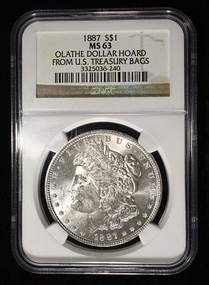1887 MORGAN DOLLAR NGC MS-63 OLATHE HOARD. TOP RATED AUCTION HOUSE ESTIMATE $130 - $150.