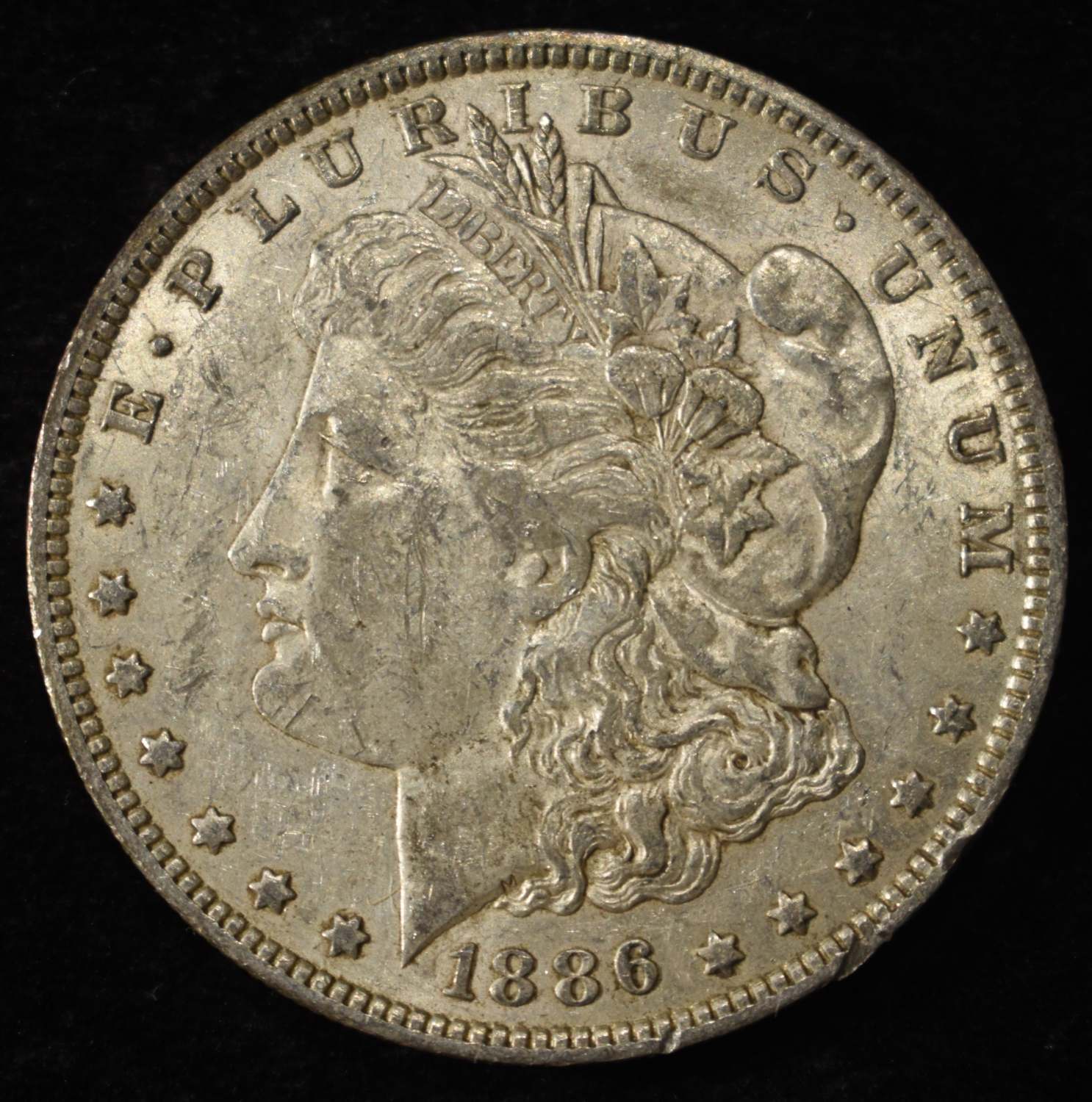 1886-O MORGAN DOLLAR XF/AU