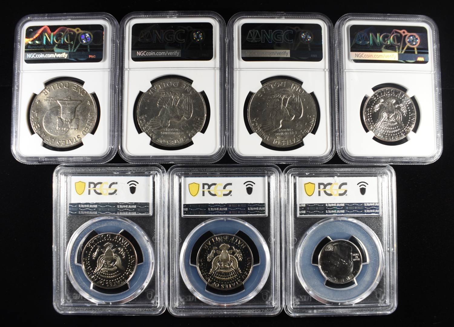 (1) GRADED 25C, (3) GRADED 50C & (3) GRADED $1
