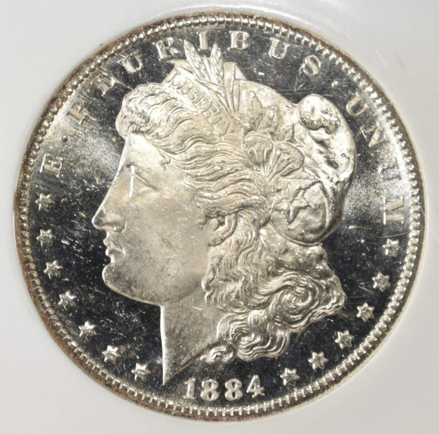 1884-CC MORGAN DOLLAR PCI SUPERB GEM BU DMPL