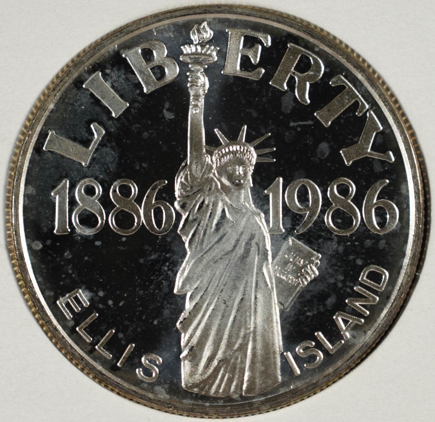 1886-1986 1 OZ .999 SILVER ROUND