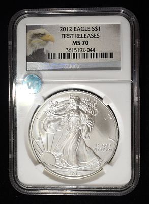 2012 AMERICAN SILVER EAGLE NGC MS70. BID WITH SILVER CITY AUCTIONS ESTIMATE $190 - $240.