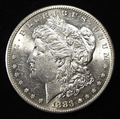 1883-S MORGAN DOLLAR BU. TOP RATED AUCTION HOUSE ESTIMATE $1300 - $1500.