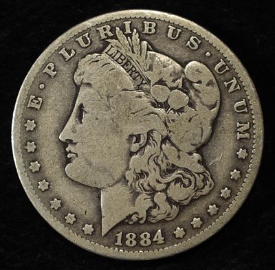 1884-O MORGAN DOLLAR. BID WITH SILVER CITY AUCTIONS ESTIMATE $80 - $120.