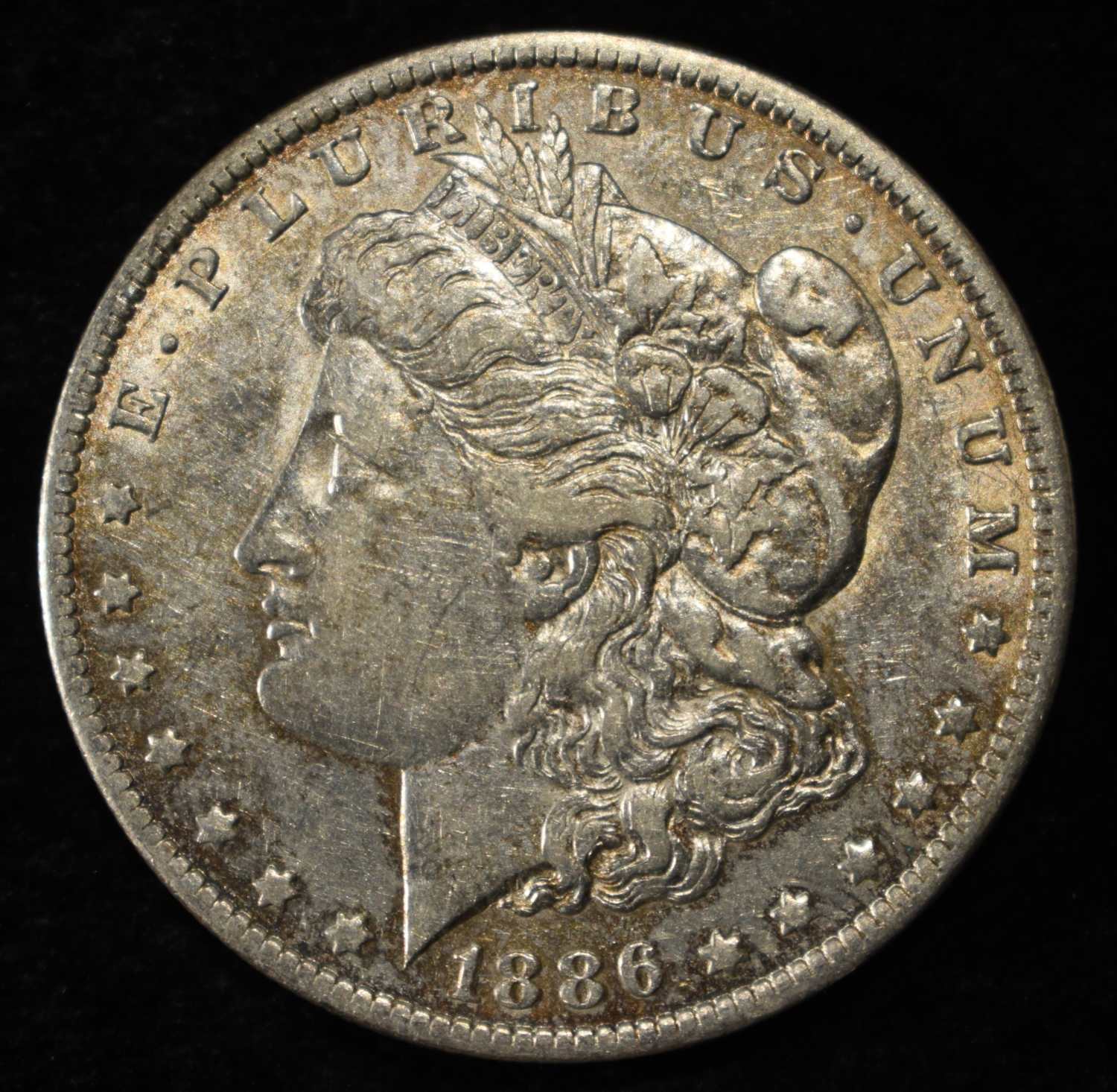 1886-O MORGAN DOLLAR XF/AU