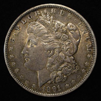 1891-O MORGAN DOLLAR XF/AU. TOP RATED AUCTION HOUSE ESTIMATE $130 - $150.