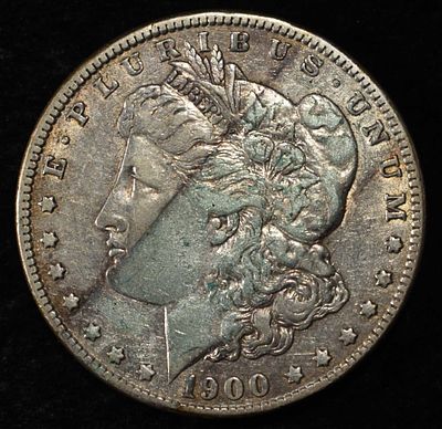 1900-O MORGAN DOLLAR. WEEKLY COIN & CURRENCY AUCTIONS ESTIMATE $90 - $130.