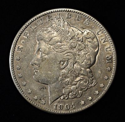 1904-S MORGAN DOLLAR XF. LEADERS IN ON-LINE AUCTIONS ESTIMATE $400 - $450.
