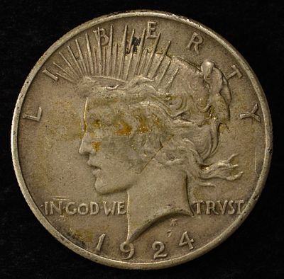 1924 PEACE DOLLAR. TOP RATED AUCTION HOUSE ESTIMATE $90 - $130.