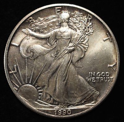 1990 AMERICAN SILVER EAGLE. TOP RATED AUCTION HOUSE ESTIMATE $110 - $160.