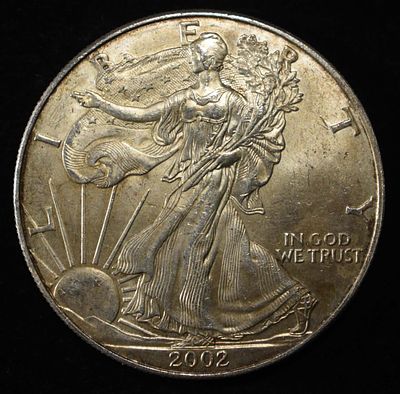 2002 AMERICAN SILVER EAGLE. BID WITH SILVER CITY AUCTIONS ESTIMATE $100 - $150.