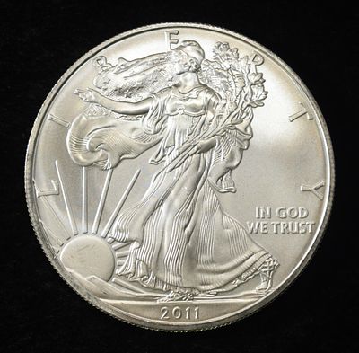 2011 AMERICAN SILVER EAGLE. LEADERS IN ON-LINE AUCTIONS ESTIMATE $110 - $160.